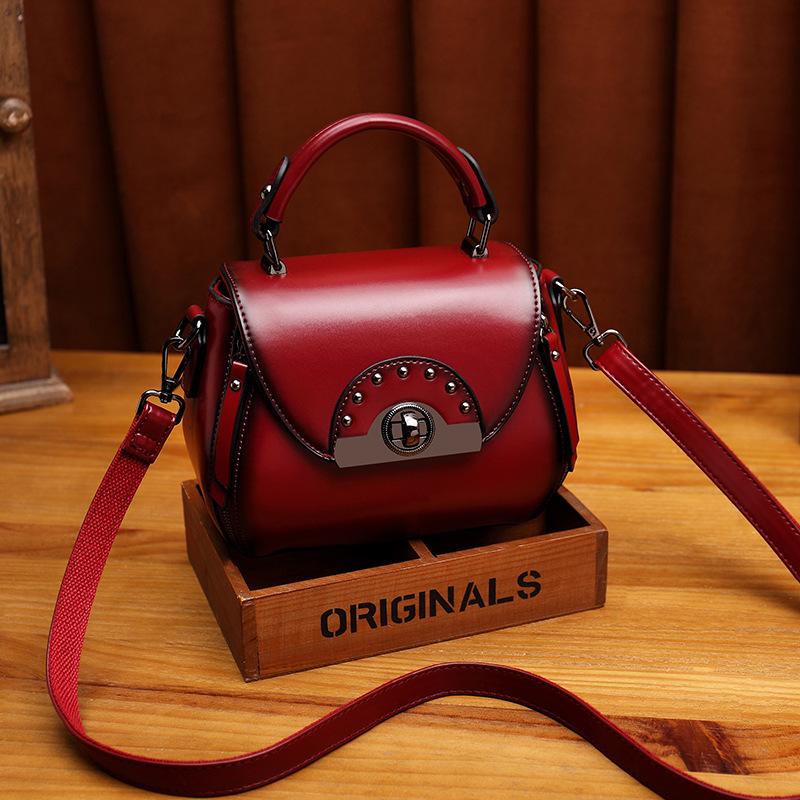 Leather Vintage Leather one shoulder portable diagonal span bag rivet saddle bag